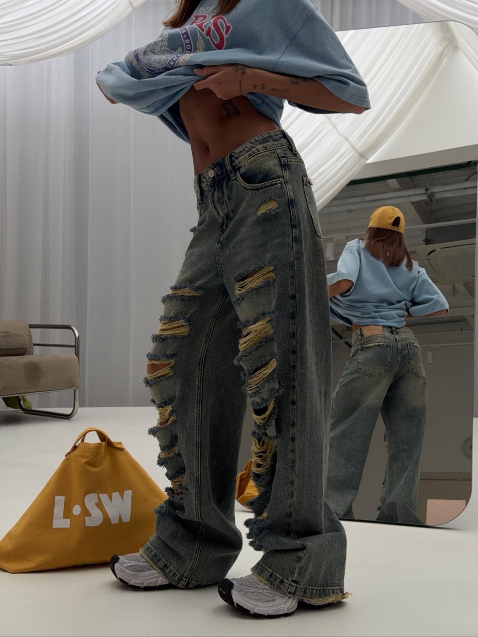 Джинсы рваные с грязным эффектом